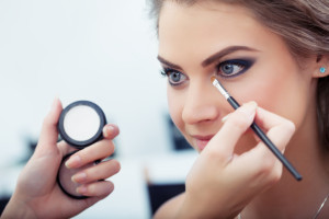 Applying eyeshadow